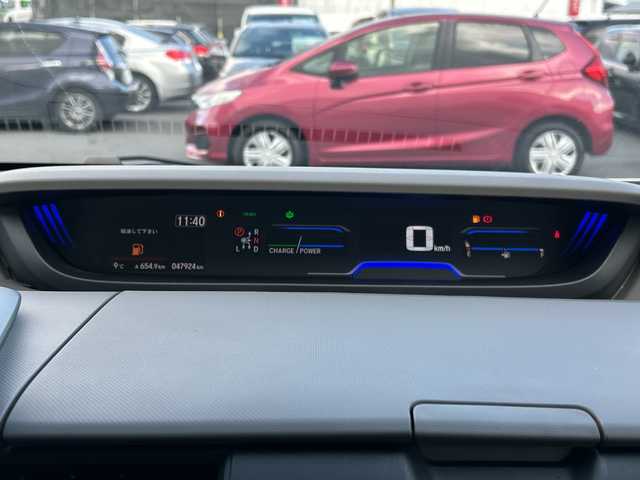 ホンダ フリード ハイブリット G ホンダセンシング 長野県 2021(令3)年 4.8万km プラチナホワイトパール ・社外メーカーオプションナビ/(Bluetooth/CD/DVD/フルセグTV/HDMI)/・バックカメラ/・USB入力端子/・前後ドライブレコーダー/・両側パワースライドドア/・純正フロアマット/・社外モデューロエアロ(フロント/サイド/リア)/・社外17インチアルミホイール/・コーナーセンサー/・レーンキープアシスト/・クルーズコントロール/・LEDヘッドライト/・社外キャリパー/・社外サブウーハー(TS-WX130DA)