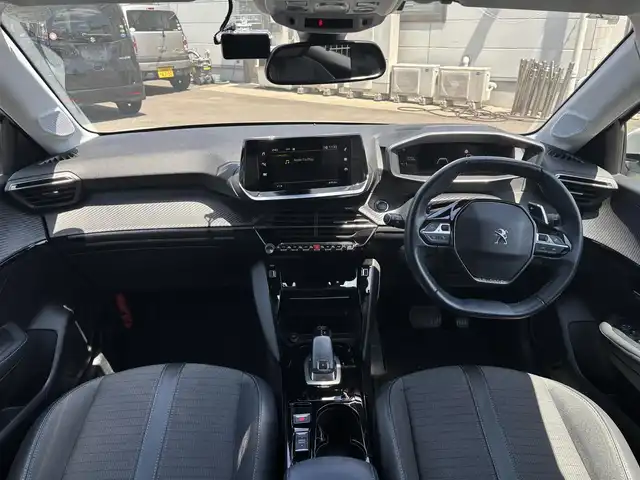 プジョー ２０８ アリュール 愛知県 2021(令3)年 6.3万km パール 純正ディスプレイオーディオ/　(BT/USB/iPod/AppleCarPlay/AndroidAuto)/バックカメラ/ETC/前後ドライブレコーダー/衝突軽減ブレーキ/レーンアシスト/クリアランスソナー/置くだけ充電/ハーフレザーシート/電動パーキングブレーキ/パドルシフト/プッシュスタート/純正フロアマット/スマートキー×2