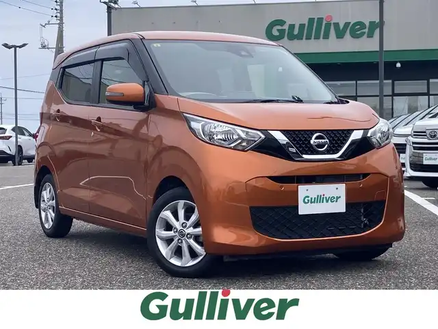日産 デイズ X 島根県 2020(令2)年 3.7万km プレミアムサンシャインオレンジ ディーラーOPナビ(CD/DVD/BT/フルセグ)/エマージェンシーブレーキ/車線逸脱警報/全方位カメラ/アイドリングストップ/ステアリングリモコン/前後ドラインブレコーダー/オートライト/純正ドアバイザー/純正フロアマット