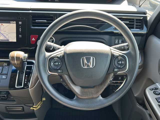 ホンダ ステップワゴン G EX 山形県 2015(平27)年 8.7万km プレミアムディープロッソパール 禁煙車/4WD/クルーズコントロール/ホンダセンシング/アイドリングストップ/純正ナビ/（Bluetooth/CD/DVD/フルセグ)/両側パワースライドドア/寒冷地仕様/バックカメラ/前後ドライブレコーダー/デジタルインナーミラー/わくわくゲート/HIDオートライト/前席シートヒーター/ステアリングスイッチ/ビルトインETC/純正AWサマータイヤ(205/60/R16・5mm)4本積載/電動格納ミラー/ウィンカーミラー/スマートキー/エンジンスターター/ドアバイザー