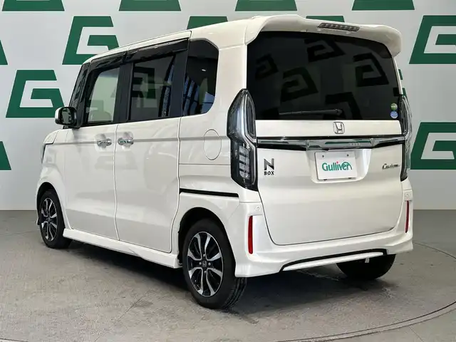 ホンダ Ｎ ＢＯＸ カスタム G EX ホンダセンシング 鹿児島県 2018(平30)年 7.1万km プレミアムホワイトパールⅡ 禁煙車/社外ナビ/フルセグ/バックカメラ/クルコン/コーナーセンサー/純正アルミ/純正フロアマット/LEDヘッドライト/オートライト/チップアップシート/レーンキープアシスト/プッシュスタート/アイドリングストップ/片側パワースライドドア/Bluetooth