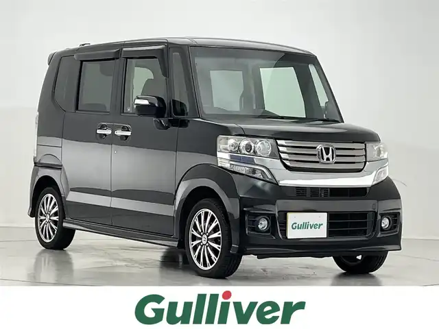 ホンダ Ｎ ＢＯＸ カスタム G ターボパッケージ 滋賀県 2013(平25)年 5.8万km クリスタルブラックパール 禁煙車/社外ナビ/（フルセグTV/Bluetooth/CD/DVD/SD/USB)/両側パワースライドドア/ステアリングスイッチ/本革巻ステアリング/クルーズコントロール/パドルシフト/スマートキー/スペアキー/オートライト/電動格納ミラー/ＥＴＣ/プッシュスタート/純正15インチアルミホイール/純正フロアマット