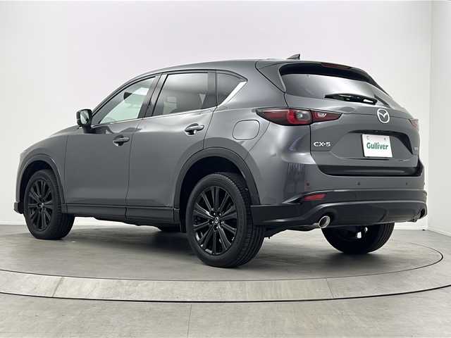 マツダ ＣＸ－５ XD スポーツアピアランス 大阪府 2021(令3)年 3万km マシーングレープレミアムM 【特別装備】/クルージング＆トラフィック・サポート/電動格納リモコン式カラードドアミラー：グロスブラック/フロント＆リアバンパーガーニッシュ/クラッディング／ボディロアガーニッシュ/マフラーカッター（大径）/ＬＥＤ室内照明／オーバーヘッドコンソール/(装備)/・ダウンライト／バニティミラー照明）/ワイヤレス充電（Ｑｉ）/・２２５／５５Ｒ１９タイヤ＆１９インチアルミホイール（ブラックメタリック塗装）（ＳｐｏｒｔｓＡｐｐｅａｒａｎｃｅ専用）/・デコレーションパネル（インパネ／ドアトリム）：ハニカムブラック／サテンクロームメッキ/・シグネチャーウイング（ブラッククローム）/・フロントグリルアクセント（クラシックレッド）/・純正ナビ/TV/ブルートゥース/AM/FM/・全方位カメラ/・前席パワーシート/・電動リアゲート/・電動パーキング/（i-ACTIVSENSE）/・認知/車線逸脱警報/BSM/LKA/SBS/SCBS/・ドライバーアクションアラート/速度標識認識/・アクティブLED/ステアリングヒーター/ドライブレコーダーZPR-075/スペアキー/パドルシフト/ETC