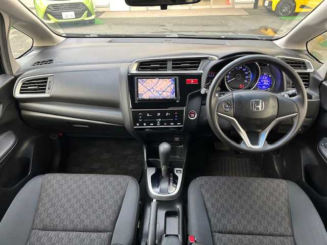 ホンダ フィット 13G Sパッケージ 東京都 2014(平26)年 1.8万km クリスタルブラックパール ワンオーナー/社外SDナビ/フルセグテレビ/バックカメラ/Bluetooth接続/DVD/CD再生/アイドリングストップ/プッシュスタート/ETC/オートライト/オートエアコン/プライバシーガラス/パワーウィンドウ/スペアキー/保証書＆取扱説明書付き