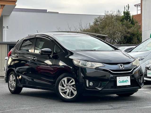 ホンダ フィット 13G Sパッケージ 東京都 2014(平26)年 1.8万km クリスタルブラックパール ワンオーナー/社外SDナビ/フルセグテレビ/バックカメラ/Bluetooth接続/DVD/CD再生/アイドリングストップ/プッシュスタート/ETC/オートライト/オートエアコン/プライバシーガラス/パワーウィンドウ/スペアキー/保証書＆取扱説明書付き