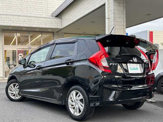 ホンダ フィット 13G Sパッケージ 東京都 2014(平26)年 1.8万km クリスタルブラックパール ワンオーナー/社外SDナビ/フルセグテレビ/バックカメラ/Bluetooth接続/DVD/CD再生/アイドリングストップ/プッシュスタート/ETC/オートライト/オートエアコン/プライバシーガラス/パワーウィンドウ/スペアキー/保証書＆取扱説明書付き