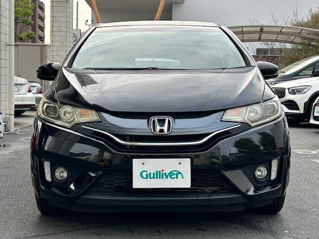 ホンダ フィット 13G Sパッケージ 東京都 2014(平26)年 1.8万km クリスタルブラックパール ワンオーナー/社外SDナビ/フルセグテレビ/バックカメラ/Bluetooth接続/DVD/CD再生/アイドリングストップ/プッシュスタート/ETC/オートライト/オートエアコン/プライバシーガラス/パワーウィンドウ/スペアキー/保証書＆取扱説明書付き