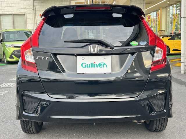 ホンダ フィット 13G Sパッケージ 東京都 2014(平26)年 1.8万km クリスタルブラックパール ワンオーナー/社外SDナビ/フルセグテレビ/バックカメラ/Bluetooth接続/DVD/CD再生/アイドリングストップ/プッシュスタート/ETC/オートライト/オートエアコン/プライバシーガラス/パワーウィンドウ/スペアキー/保証書＆取扱説明書付き