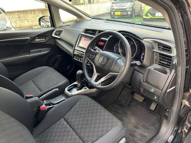 ホンダ フィット 13G Sパッケージ 東京都 2014(平26)年 1.8万km クリスタルブラックパール ワンオーナー/社外SDナビ/フルセグテレビ/バックカメラ/Bluetooth接続/DVD/CD再生/アイドリングストップ/プッシュスタート/ETC/オートライト/オートエアコン/プライバシーガラス/パワーウィンドウ/スペアキー/保証書＆取扱説明書付き