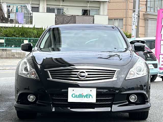 日産 スカイライン 370GT Type S 神奈川県 2013(平25)年 8.4万km スーパーブラック ワンオーナー/純正HDDナビ(CD/DVD/USB/ワンセグTV)/バックカメラ/18インチENKEIアルミホイール/パドルシフト/ハーフレザーシート/D/N席パワーシート/横滑り防止装置/ビルトインETC/オートライト/純正フロアマット/プッシュスタート/ステアリングスイッチ/ISOFIX/スペアキー×1/取扱説明書/保証書