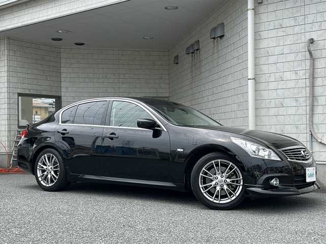 日産 スカイライン 370GT Type S 神奈川県 2013(平25)年 8.4万km スーパーブラック ワンオーナー/純正HDDナビ(CD/DVD/USB/ワンセグTV)/バックカメラ/18インチENKEIアルミホイール/パドルシフト/ハーフレザーシート/D/N席パワーシート/横滑り防止装置/ビルトインETC/オートライト/純正フロアマット/プッシュスタート/ステアリングスイッチ/ISOFIX/スペアキー×1/取扱説明書/保証書