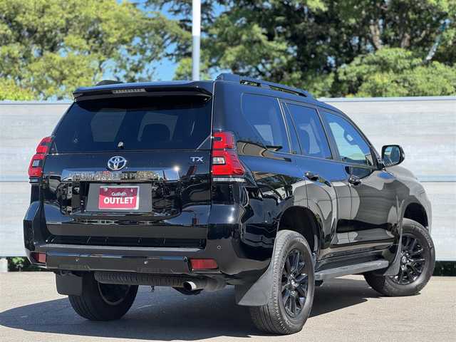 トヨタ ランドクルーザー プラド TX-L 70thアニバーサリーLTD 三重県 2022(令4)年 3.3万km ブラック ワンオーナー/ムーンルーフ/ブラックルーフレール/セーフティセンス/アルパインメモリナビ・地デジTV/・DVD/CD/・Bluetooth/バックカメラ/クリアランスソナー/レーンディパーチャーアラート/レーダークルーズコントロール/サドルタン革シート/・前席パワーシート/・前席快適温熱シート/電動格納シート(3列目)/ビルトインETC/純正18インチアルミホイール/LEDヘッドランプ/・オートライト/オートマチックハイビーム/LEDフォグランプ/プッシュエンジンスタート/スマートキー×2/新車時保証書/取扱説明書