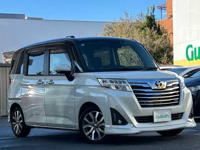 トヨタ ルーミー カスタムG－T 東京都 2019(令1)年 3.8万km ブラックマイカメタリック/パールホワイト2トーン ワンオーナー/純正SDナビフルセグTV/バックカメラ/両側パワースライドドア/衝突被害軽減システム/衝突警報機能（対車両・歩行者）/車線逸脱警報機能/誤発進抑制制御機能/先行車発進お知らせ機能/クルーズコントロール/横滑り防止装置/盗難防止装置/アイドリングストップ/パーキングアシスト/オートライト/オートマチックハイビーム/シルバー加飾付ウレタン製ステアリングホイール/ステアリングスイッチ/Bluetooth接続/シートヒータ/キーフリーシステム/スペアキー/保証書＆取扱説明書付き