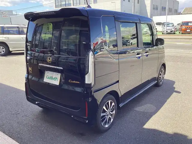 ホンダ Ｎ ＢＯＸ カスタム 栃木県 2024(令6)年 0.1万km クリスタルブラックパール ホンダセンシング/（衝突軽減ブレーキ）/（先行車発進お知らせ機能）/（歩行者事故低減ステアリング）/（路外逸脱抑制機能）/（標識認識機能）/（渋滞追従機能付きアダプティブクルーズコントロール）/（車線維持支援システム）/（誤発進抑制機能）/（後方誤発進抑制機能）/（近距離衝突軽減ブレーキ）/（急アクセル制御機能）/（パーキングセンサーシステム）/（オートハイビーム）/HondaCONNECTforGathers/カーナビ連動前後ドライブレコーダー/マルチビューカメラシステム/前席シートヒーター/両側パワースライドドア/純正フロアマット/純正ドアバイザー/取扱説明書/保証書/リモコンスペアキー×1