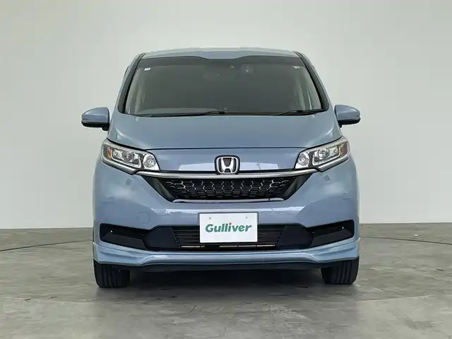 ホンダ フリード ハイブリット G ホンダセンシング 群馬県 2020(令2)年 5.1万km シーグラスブルーパール 純正９インチナビ　モデューロエアロ　バックカメラ　レーダークルーズコントロール　レーンキープアシスト　衝突軽減ブレーキ　シートヒーター　純正アルミ　両側パワースライドドア　ドラレコ　ＥＴＣ　禁煙車