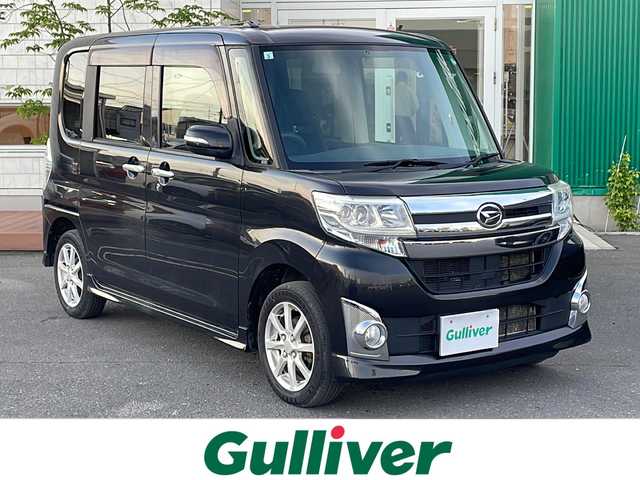 ダイハツ タント カスタム X 青森県 2015(平27)年 9.8万km ブラックマイカメタリック 4WD/純正CDオーディオ/左パワースライドドア/純正エンジンスターター/ETC/エコアイドル/プッシュスタート/スマートキー/LEDヘッドライト/フォグランプ/ウインカーミラー/純正14インチアルミ