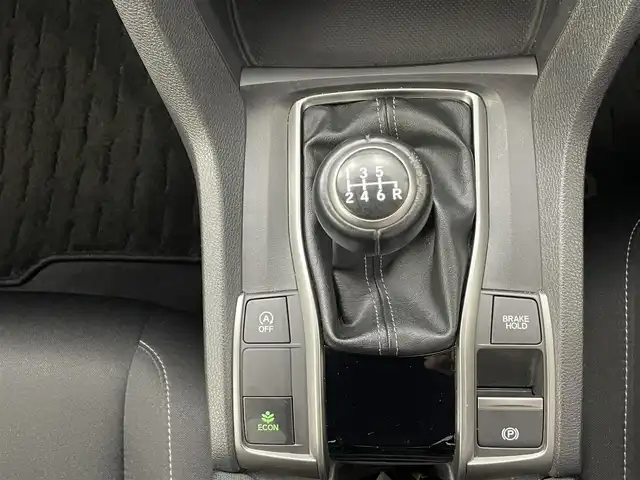 ホンダ シビック ハッチバック ホンダセンシング 熊本県 2018(平30)年 4.8万km クリスタルブラックパール ６速MT/純正7インチナビVXM-195VFi（ＣＤ・ＤＶＤ・フルセグ・ＢＴ・ＳＤ）/バックカメラ　/ビルトインＥＴＣ　/社外前方ドライブレコーダー　/前席シートヒーター　/衝突軽減ブレーキ　/レーンキープアシスト　/横滑り防止　/アイドリングストップ/純正フロアマット/純正１８インチAW/オートライト/LEDヘッドライト/スマートキー/プッシュスタート/スペアキー1本/保証書/取扱説明書
