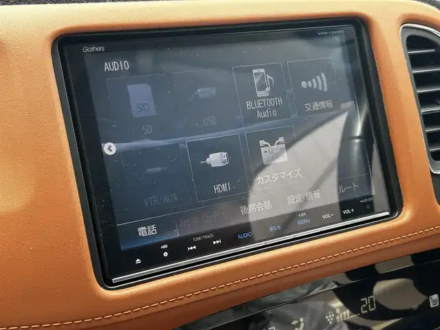ホンダ ヴェゼル ハイブリッド Z ホンダセンシング 滋賀県 2017(平29)年 6万km プレミアムクリスタルレッドM 純正8インチナビ/【Bluetooth/CD/DVD/フルセグTV/USB/HDMI】/ハーフレザーシート/バックカメラ/ホンダセンシング/・衝突軽減ブレーキ/・歩行者事故低減ステアリング/・アダプティブクルーズコントロール/・LKAS 〈車線維持支援システム〉/・路外逸脱抑制機能/・誤発進抑制機能/・先行車発進お知らせ機能/・標識認識機能/LEDヘッドライト/オートライト/D/Nシートヒーター/ビルトインETC/前方ドライブレコーダー/パドルシフト/純正フロアマット/ドアバイザー/プッシュスタート/スマートキー/ステアリングリモコン