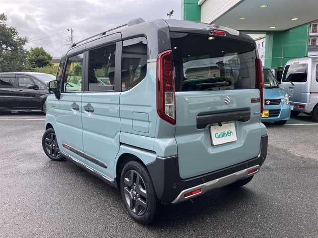 スズキ スペーシア ギア HYBRID XZターボ 埼玉県 2025(令7)年 0.3万km オフブルーメタリック/ガンメタリック2トーンルーフ ワンオーナー/衝突被害軽減ブレーキ/レーダークルーズコントロール/前後コーナーセンサー/バックカメラ/純正ナビ・オーディオ/Panasonic：CN-HZ8A5/（フルセグTV/BT/CD/DVD/FM/AM）/前後ドラレコ/レーダー探知機/ヘッドアップディスプレイ/両側パワースライドドア/ビルトンETC/前席シートヒーター/ステアリングヒーター/ステアリングリモコン/パドルシフト/革巻きステアリング/後席オットマン/後席サンシェード/ヘッドアップディスプレイ/USBポート×4/フォグライト/スマートキー（スペアキーあり）/車両取説、ナビ取説、メンテナンスノートあり/プッシュスタート/アイドリングストップ