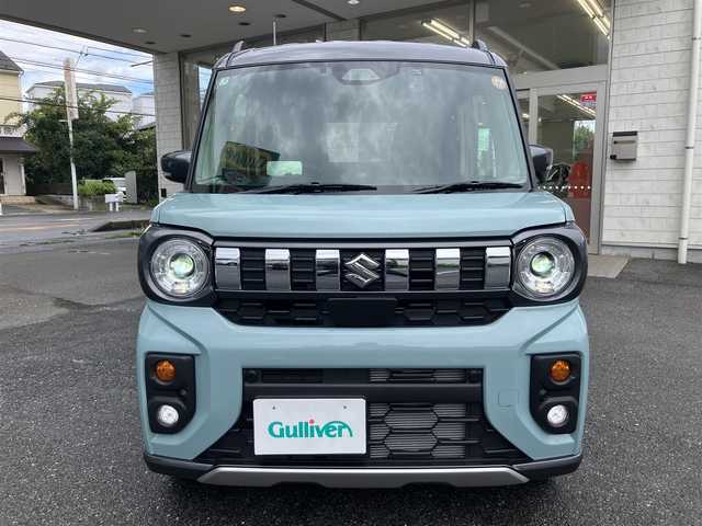 スズキ スペーシア ギア HYBRID XZターボ 埼玉県 2025(令7)年 0.3万km オフブルーメタリック/ガンメタリック2トーンルーフ ワンオーナー/衝突被害軽減ブレーキ/レーダークルーズコントロール/前後コーナーセンサー/バックカメラ/純正ナビ・オーディオ/Panasonic：CN-HZ8A5/（フルセグTV/BT/CD/DVD/FM/AM）/前後ドラレコ/レーダー探知機/ヘッドアップディスプレイ/両側パワースライドドア/ビルトンETC/前席シートヒーター/ステアリングヒーター/ステアリングリモコン/パドルシフト/革巻きステアリング/後席オットマン/後席サンシェード/ヘッドアップディスプレイ/USBポート×4/フォグライト/スマートキー（スペアキーあり）/車両取説、ナビ取説、メンテナンスノートあり/プッシュスタート/アイドリングストップ