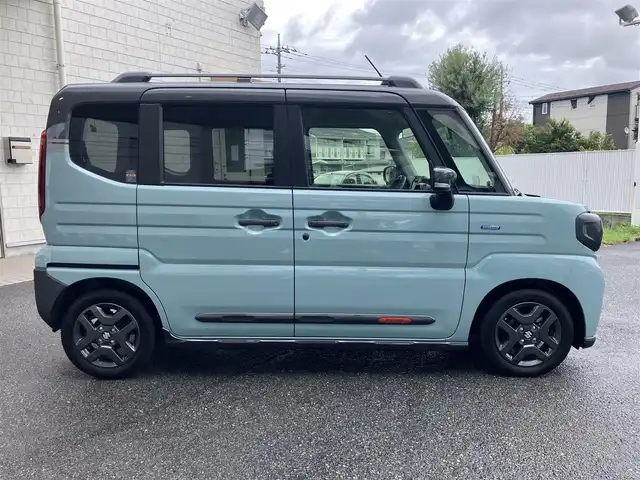 スズキ スペーシア ギア HYBRID XZターボ 埼玉県 2025(令7)年 0.3万km オフブルーメタリック/ガンメタリック2トーンルーフ ワンオーナー/衝突被害軽減ブレーキ/レーダークルーズコントロール/前後コーナーセンサー/バックカメラ/純正ナビ・オーディオ/Panasonic：CN-HZ8A5/（フルセグTV/BT/CD/DVD/FM/AM）/前後ドラレコ/レーダー探知機/ヘッドアップディスプレイ/両側パワースライドドア/ビルトンETC/前席シートヒーター/ステアリングヒーター/ステアリングリモコン/パドルシフト/革巻きステアリング/後席オットマン/後席サンシェード/ヘッドアップディスプレイ/USBポート×4/フォグライト/スマートキー（スペアキーあり）/車両取説、ナビ取説、メンテナンスノートあり/プッシュスタート/アイドリングストップ