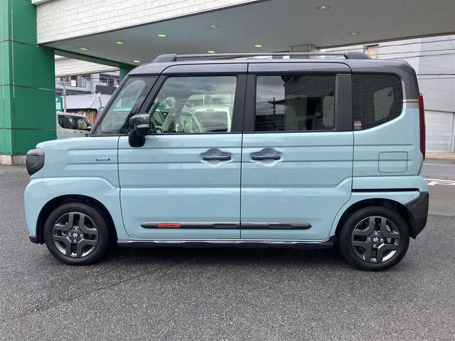 スズキ スペーシア ギア HYBRID XZターボ 埼玉県 2025(令7)年 0.3万km オフブルーメタリック/ガンメタリック2トーンルーフ ワンオーナー/衝突被害軽減ブレーキ/レーダークルーズコントロール/前後コーナーセンサー/バックカメラ/純正ナビ・オーディオ/Panasonic：CN-HZ8A5/（フルセグTV/BT/CD/DVD/FM/AM）/前後ドラレコ/レーダー探知機/ヘッドアップディスプレイ/両側パワースライドドア/ビルトンETC/前席シートヒーター/ステアリングヒーター/ステアリングリモコン/パドルシフト/革巻きステアリング/後席オットマン/後席サンシェード/ヘッドアップディスプレイ/USBポート×4/フォグライト/スマートキー（スペアキーあり）/車両取説、ナビ取説、メンテナンスノートあり/プッシュスタート/アイドリングストップ