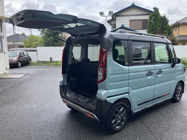 スズキ スペーシア ギア HYBRID XZターボ 埼玉県 2025(令7)年 0.3万km オフブルーメタリック/ガンメタリック2トーンルーフ ワンオーナー/衝突被害軽減ブレーキ/レーダークルーズコントロール/前後コーナーセンサー/バックカメラ/純正ナビ・オーディオ/Panasonic：CN-HZ8A5/（フルセグTV/BT/CD/DVD/FM/AM）/前後ドラレコ/レーダー探知機/ヘッドアップディスプレイ/両側パワースライドドア/ビルトンETC/前席シートヒーター/ステアリングヒーター/ステアリングリモコン/パドルシフト/革巻きステアリング/後席オットマン/後席サンシェード/ヘッドアップディスプレイ/USBポート×4/フォグライト/スマートキー（スペアキーあり）/車両取説、ナビ取説、メンテナンスノートあり/プッシュスタート/アイドリングストップ