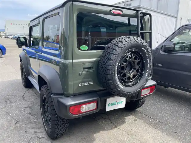スズキ ジムニー シエラ JC 新潟県 2022(令4)年 1万km ジャングルグリーン 【４ＷＤ】/ワンオーナー/純正メモリナビ/(CN-RZ875)/フルセグ＆ＤＶＤ＆ＢＴ/バックモニター/ＲＡＹＳ１６アルミ/ＬＥＤ/フォグ/シートカバー/スマートキー/スペアキー/ＥＴＣ/リアラダー/革巻ステアリング/ライトウォッシャー/ステアリングスイッチ/保証書＆整備手帳＆取説