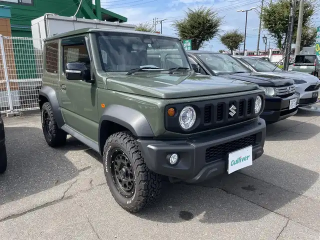 スズキ ジムニー シエラ JC 新潟県 2022(令4)年 1万km ジャングルグリーン 【４ＷＤ】/ワンオーナー/純正メモリナビ/(CN-RZ875)/フルセグ＆ＤＶＤ＆ＢＴ/バックモニター/ＲＡＹＳ１６アルミ/ＬＥＤ/フォグ/シートカバー/スマートキー/スペアキー/ＥＴＣ/リアラダー/革巻ステアリング/ライトウォッシャー/ステアリングスイッチ/保証書＆整備手帳＆取説
