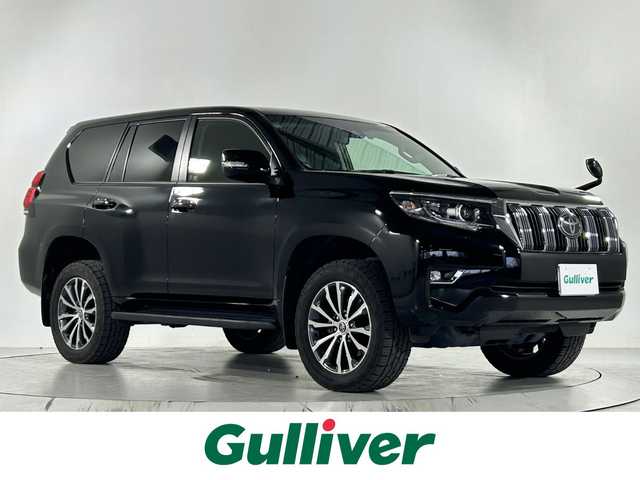トヨタ ランドクルーザー プラド TX Lパッケージ 佐賀県 2018(平30)年 7.1万km ブラック ワンオーナー/純正9インチナビ/フルセグ/Bluetooth/CD/DVD/バックカメラ/ビルトインETC/ドライブレコーダー/衝突被害軽減システム/レーダークルーズコントロール/レーンアシスト/クリアランスソナー/LEDヘッドライト/フォグランプ/オートライト/オートマチックハイビーム/運転席・助手席パワーシート/運転席・助手席シートベンチレーション/電動格納サードシート/純正フロアマット/純正サイドステップ/ジュ運勢19インチアルミホイール
