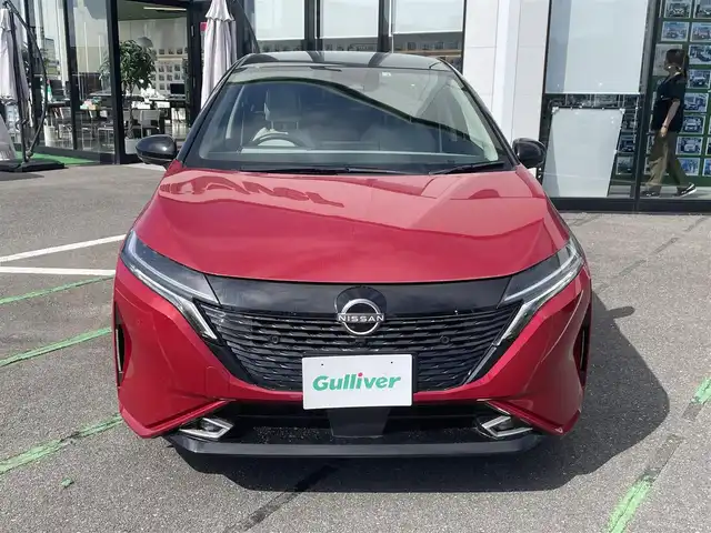 日産 オーラ G レザーエディション 長崎県 2022(令4)年 6.2万km ガーネットレッド/スーパーブラック 2トーン 全方位カメラ/ホワイトレザーシート/プロパイロット/ＢＯＳＥサウンド/エマージェンシーブレーキ/レーンキープアシスト/ブラインドスポットモニター/スマートキー/デジタルインナーミラー/クリアランスソナー/ＥＴＣ２．０/ドライブレコーダー/ステアリングスイッチ/レーダークルーズコントロール/レーンキープアシスト/LEDヘッドライト/オートライト
