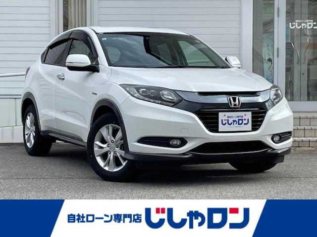 ホンダ ヴェゼル ハイブリッド X 富山県 2014(平26)年 10.8万km ホワイトオーキッドパール (株)IDOMが運営する【じしゃロン富山店】の自社ローン対象車両になります。こちらは現金ご利用時の価格です。自社ローンご希望の方は別途その旨お申付け下さい。/社外ナビ/FM/AM/CD/DVD/フルセグ/SD/バックカメラ/ETC/シティブレーキアクティブシステム/横滑り防止装置/LEDヘッドライト/フォグランプ/オートライト/ドアバイザー/クルーズコントロール/電子パーキングブレーキ/ステアリングリモコン/プッシュスタート/スマートキー/スペアキー１本/取説/保証書