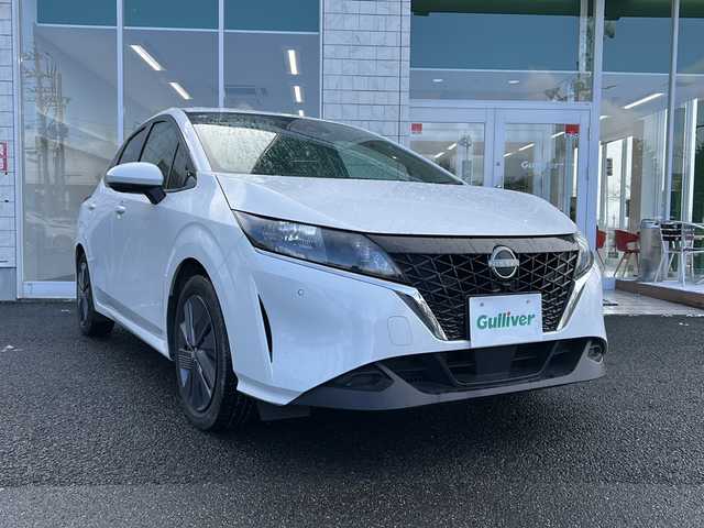 日産 ノート X FOUR 福島県 2023(令5)年 8.3万km ピュアホワイトパール 360°セーフティアシスト/・踏み間違い衝突防止アシスト/・インテリジェントエマージェンシーブレーキ/・車線逸脱警報/・前方衝突予測警報/純正ディスプレイオーディオナビ/・フルセグTV/USB/HDMI/FM/AM/・AppleCarPlay/AndroidAuto/・ビルトインETC2.0/・バックカメラ/・アラウンドビューモニター/デジタルインナーミラー/革張りステアリング/・ステアリングスイッチ/・ステアリングヒーター/・クルーズコントロール追従あり/電子パーキング/・オートブレーキホールド/D+N席シートヒーター/ワイヤレス充電/電動格納ミラー/プッシュスタート/・スマートキー/ハロゲンヘッドライト/・オートライト/・オートマチックハイビーム/純正フロアマット/レンタカーアップ