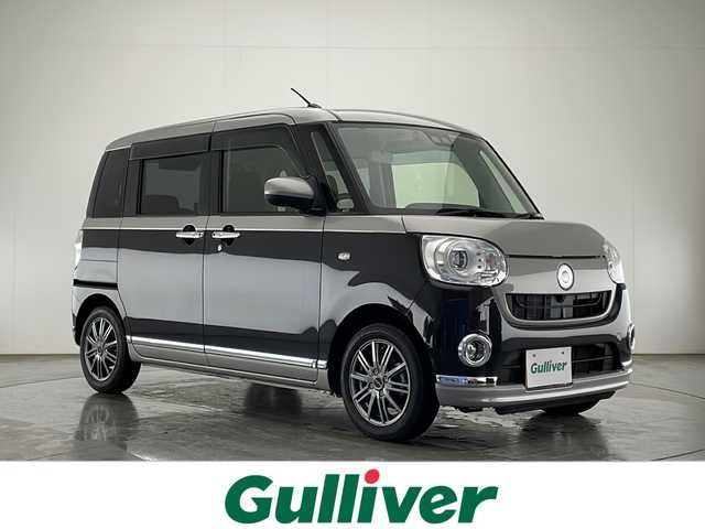 ダイハツ ムーヴ キャンバス G ブラックインテリア VS SAⅢ 宮崎県 2021(令3)年 6.9万km スムースグレーマイカメタリック/ブラックマイカメタリック 2トーン 禁煙車/衝突被害軽減ブレーキ/純正ナビTV/（NMZK-W71D/CD/DVD/Bluetooth/フルセグTV)/純正セキュリティアラーム/純正LEDオートライト/純正LEDフォグ/純正フロアマット/社外14インチアルミ/両側電動スライドドア/オートマチックハイビーム/クリアランスソナー/オートエアコン/ブラックインテリア/ウインカードアミラー/オート電動格納ミラー/本革巻ハンドル/ETC/スマートキー/プッシュエンジンスタート/スペアキー/新車時保証書/取扱い説明書