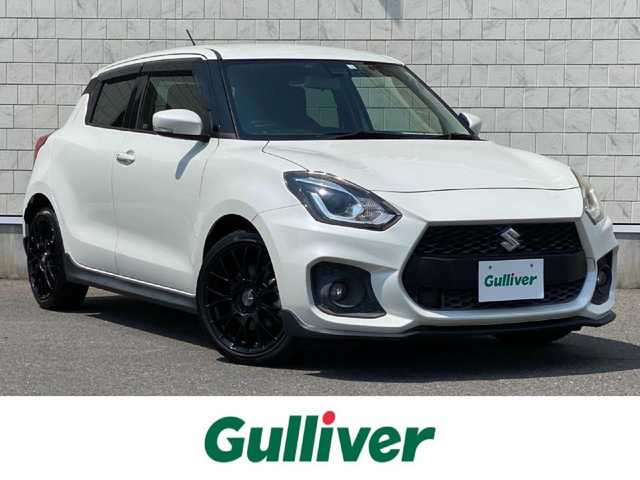 スズキ スイフト スポーツ セーフティPKG 岐阜県 2018(平30)年 3.7万km ピュアホワイトP ENKEI製17インチAW/スズキセーフティサポート/・デュアルセンサーブレーキサポート/・アダプティブクルーズコントロール/・車線逸脱抑制機能/・車線逸脱警報機能/Panasonic製8型ナビ（OP）/（フルセグTV/CD/DVD/Bluetooth/ipod）/TVキャンセラー/専用スポーツシート/運転席シートヒーター/革巻きステアリング/MTモード付AT/パドルシフト/LEDヘッドライト/フロントフォグ/アルミペダル/ドアバイザー/純正フロアマット/純正ビルトインETC/前方ドライブレコーダー/GPSレーダー探知機