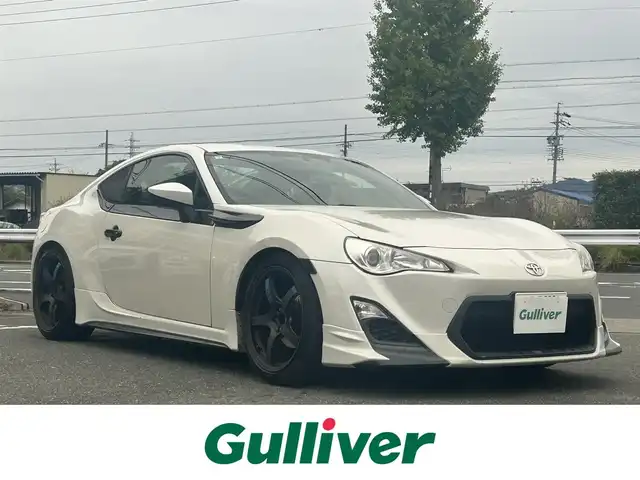 トヨタ ８６ G 愛知県 2013(平25)年 6.7万km サテンホワイトパール 純正メモリナビ/フルセグテレビ/バックカメラ/Bluetooth/ETC/RAYS AW/BLITZタワーバー/BLITZ車庫調/TRDエアロ