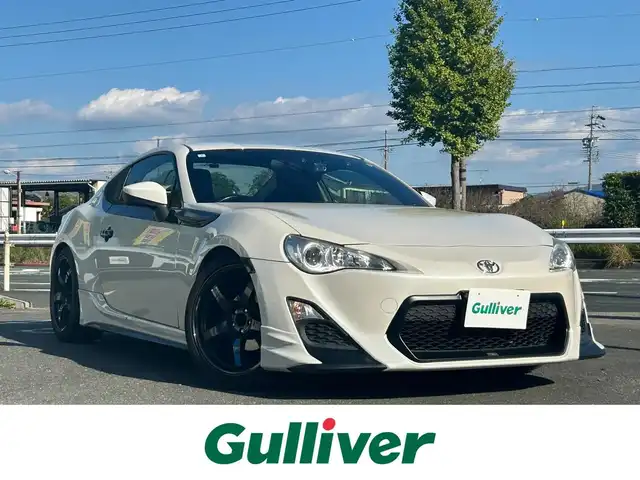 トヨタ ８６ G 愛知県 2013(平25)年 6.7万km サテンホワイトパール 純正メモリナビ/フルセグテレビ/バックカメラ/Bluetooth/ETC/RAYS AW/BLITZタワーバー/BLITZ車庫調/TRDエアロ