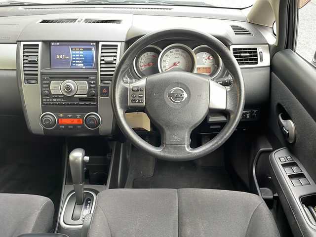 日産 ティーダ 15S 岐阜県 2008(平20)年 7万km サファイアブラック 禁煙車/AM/FM/CD/DVD/純正HDDナビ/ワンセグTV/サイドカメラ/バックカメラ/社外ETC/純正フロアマット/ハンドルスイッチ/盗難防止/オートエアコン/ヘッドライトレベライザー/Wエアバッグ/ドアバイザー/スマートキー