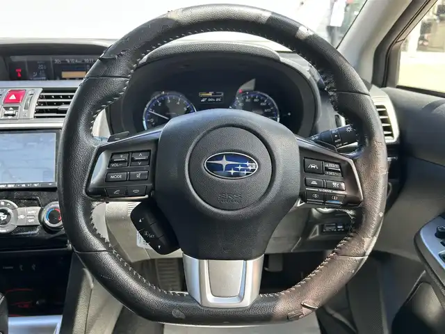 スバル レヴォーグ 1．6GT－S アイサイト 山形県 2014(平26)年 10.9万km ライトニングレッド 4WD/純正ナビ/フルセグTV/FM/AM/DVD/iPod/クルーズコントロール/電動パーキングアシスト/アイドリングストップ/パドルシフト/横滑り防止装置/盗難防止装置/衝突軽減ブレーキ/後席モニター/角度可変ソーラーレーダー探知機/USB端子2個/純正バイザー/フォグランプ/AUTOライト/スペアキー/保証書/取扱説明書
