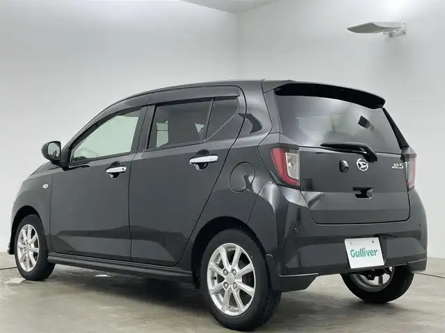 ダイハツ ミラ イース G リミテッド SAⅢ 岡山県 2019(令1)年 2.2万km ブラックマイカメタリック 純正メモリナビゲーション		/【フルセグ/Bluetooth/DVD/MSP】		/バックカメラ		/純正14inアルミホイール+サマータイヤ：装着			/フロント・サイド・リアエアロパーツ		/ETC		/LEDヘッドライト（AUTO機能付き）		/シートヒーター		/横滑り防止機能		/衝突軽減システム		/車線逸脱防止システム				/スマートキー				/プッシュスタート		/コーナーセンサー			/純正フロアマット			/取扱説明書/新車保証書