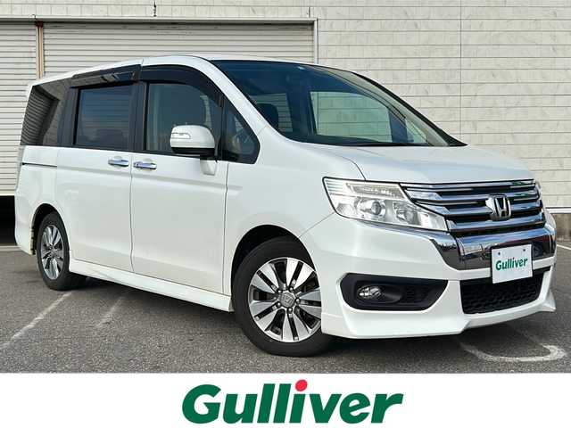 ホンダ ステップワゴン スパーダ S 新潟県 2014(平26)年 10.6万km ホワイトオーキッドパール 純正ナビ【BT/フルセグテレビ/FM・AM】/バックカメラ/アイドリングストップ/両側パワースライドドア/クルーズコントロール/純正アルミホイール/ETC/オートライト/横滑り防止装置/スマートキー