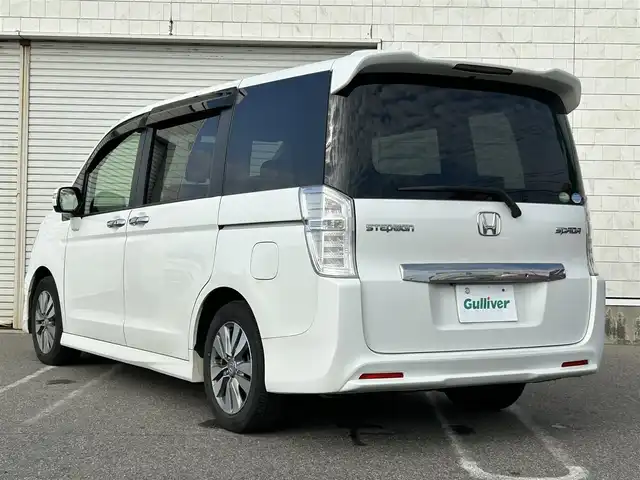 ホンダ ステップワゴン スパーダ S 新潟県 2014(平26)年 10.6万km ホワイトオーキッドパール 純正ナビ【BT/フルセグテレビ/FM・AM】/バックカメラ/アイドリングストップ/両側パワースライドドア/クルーズコントロール/純正アルミホイール/ETC/オートライト/横滑り防止装置/スマートキー