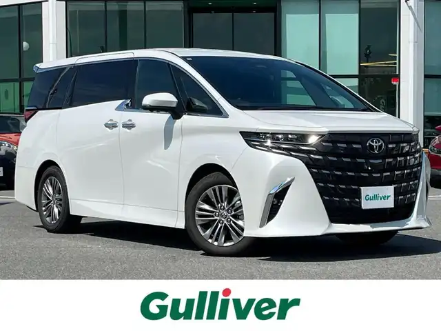 トヨタ アルファード Z 奈良県 2024(令6)年 1.2万km プラチナホワイトパールマイカ ワンオーナー/純正１４インチディスプレイオーディオ/（フルセグ/BT/AppleCarPlay/AndroidAuto)/左右独立ムーンルーフ/レーダークルーズコントロール/パノラミックビューモニター/ブラインドスポットモニター/プリクラッシュセーフティ/前後コーナーセンサー/レーンキープアシスト/パーキングアシスト/両側パワースライドドア/電動リアゲート/ヘッドアップディスプレイ/ブラックレザーシート/運転席メモリーシート/全席パワーシート/全席シートヒーター/全席エアーシート/ハンドルヒーター/デジタルインナーミラー/後席サンシェード/ETC2.0/前後ドライブレコーダー/純正18インチAW/保証書/取り扱い説明書/スペアキーX1