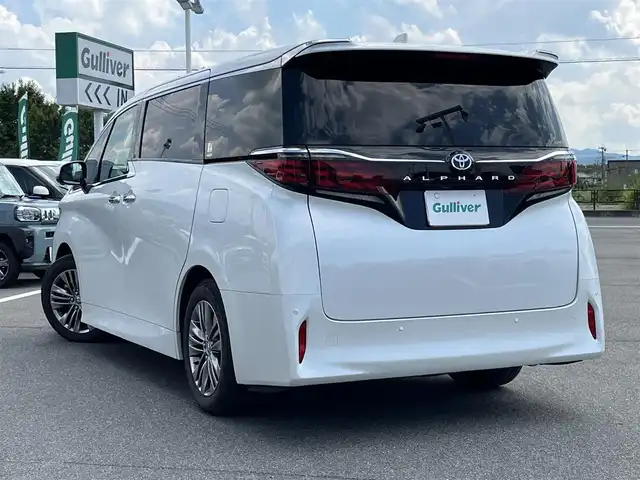 トヨタ アルファード Z 奈良県 2024(令6)年 1.2万km プラチナホワイトパールマイカ ワンオーナー/純正１４インチディスプレイオーディオ/（フルセグ/BT/AppleCarPlay/AndroidAuto)/左右独立ムーンルーフ/レーダークルーズコントロール/パノラミックビューモニター/ブラインドスポットモニター/プリクラッシュセーフティ/前後コーナーセンサー/レーンキープアシスト/パーキングアシスト/両側パワースライドドア/電動リアゲート/ヘッドアップディスプレイ/ブラックレザーシート/運転席メモリーシート/全席パワーシート/全席シートヒーター/全席エアーシート/ハンドルヒーター/デジタルインナーミラー/後席サンシェード/ETC2.0/前後ドライブレコーダー/純正18インチAW/保証書/取り扱い説明書/スペアキーX1