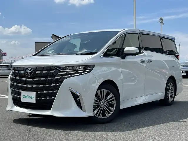 トヨタ アルファード Z 奈良県 2024(令6)年 1.2万km プラチナホワイトパールマイカ ワンオーナー/純正１４インチディスプレイオーディオ/（フルセグ/BT/AppleCarPlay/AndroidAuto)/左右独立ムーンルーフ/レーダークルーズコントロール/パノラミックビューモニター/ブラインドスポットモニター/プリクラッシュセーフティ/前後コーナーセンサー/レーンキープアシスト/パーキングアシスト/両側パワースライドドア/電動リアゲート/ヘッドアップディスプレイ/ブラックレザーシート/運転席メモリーシート/全席パワーシート/全席シートヒーター/全席エアーシート/ハンドルヒーター/デジタルインナーミラー/後席サンシェード/ETC2.0/前後ドライブレコーダー/純正18インチAW/保証書/取り扱い説明書/スペアキーX1