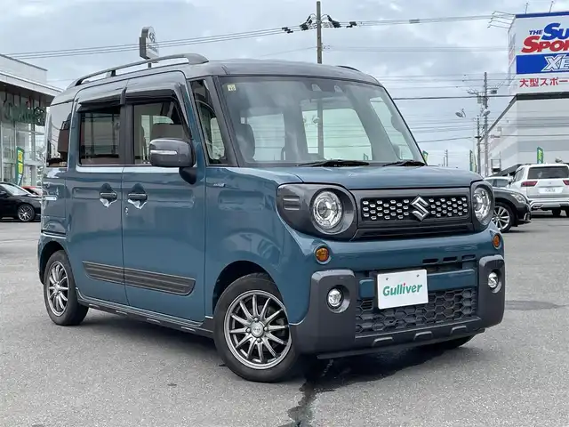 スズキ スペーシア ギア HYBRID XZターボ 道央・札幌 2020(令2)年 9.9万km デニムブルー ガンメタリック 2トーン 登録時走行距離98/439km/ターボ車/寒冷地仕様/社外メモリナビ(CD/DVD/FM/AM/SD/BT)/フルセグテレビ（走行中視聴可能）/スズキセーフティサポート/ウィンカーミラー/クルーズコントロール（追従走行あり）/ドアバイザー/プッシュスタート/両側パワースライドドア/前席シートヒーター/横滑り防止装置/ルーフレール/スマートキー/スペアキー×１/電動格納ミラー/後席テーブル/フォグランプ/ステアリングスイッチ/パドルシフト/ワイパー間欠時間コントローラー/PWRスイッチ/盗難防止装置/オートマチックハイビーム/積込冬タイヤ（純正AW/155/65/R14/22年製/溝4ｍｍ）