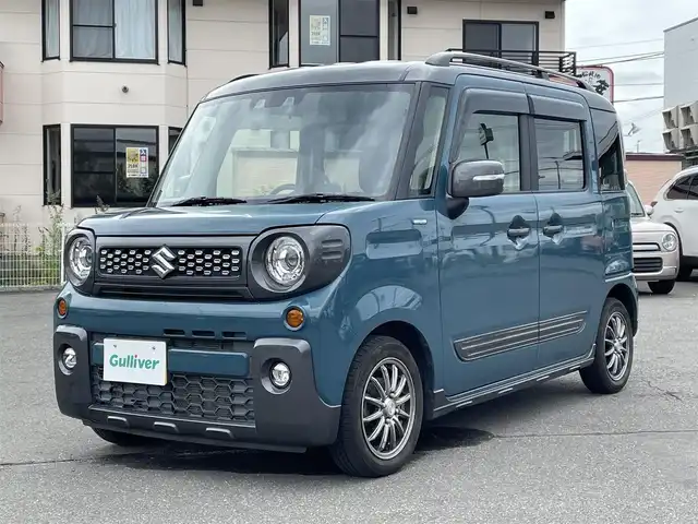 スズキ スペーシア ギア HYBRID XZターボ 道央・札幌 2020(令2)年 9.9万km デニムブルー ガンメタリック 2トーン 登録時走行距離98/439km/ターボ車/寒冷地仕様/社外メモリナビ(CD/DVD/FM/AM/SD/BT)/フルセグテレビ（走行中視聴可能）/スズキセーフティサポート/ウィンカーミラー/クルーズコントロール（追従走行あり）/ドアバイザー/プッシュスタート/両側パワースライドドア/前席シートヒーター/横滑り防止装置/ルーフレール/スマートキー/スペアキー×１/電動格納ミラー/後席テーブル/フォグランプ/ステアリングスイッチ/パドルシフト/ワイパー間欠時間コントローラー/PWRスイッチ/盗難防止装置/オートマチックハイビーム/積込冬タイヤ（純正AW/155/65/R14/22年製/溝4ｍｍ）