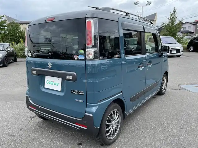 スズキ スペーシア ギア HYBRID XZターボ 道央・札幌 2020(令2)年 9.9万km デニムブルー ガンメタリック 2トーン 登録時走行距離98/439km/ターボ車/寒冷地仕様/社外メモリナビ(CD/DVD/FM/AM/SD/BT)/フルセグテレビ（走行中視聴可能）/スズキセーフティサポート/ウィンカーミラー/クルーズコントロール（追従走行あり）/ドアバイザー/プッシュスタート/両側パワースライドドア/前席シートヒーター/横滑り防止装置/ルーフレール/スマートキー/スペアキー×１/電動格納ミラー/後席テーブル/フォグランプ/ステアリングスイッチ/パドルシフト/ワイパー間欠時間コントローラー/PWRスイッチ/盗難防止装置/オートマチックハイビーム/積込冬タイヤ（純正AW/155/65/R14/22年製/溝4ｍｍ）