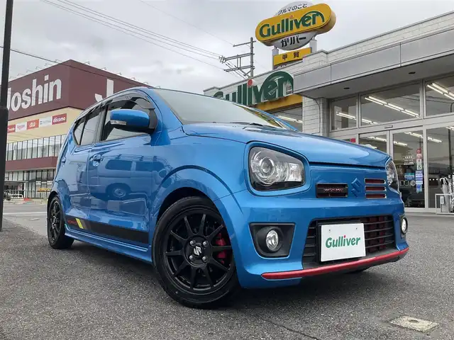 スズキ アルト ワークス 滋賀県 2019(平31)年 1.3万km ブリスクブルーM ワンオーナー/JAAA検査実施済み車両/検査時走行12313キロ/直列3気筒DOHC12バルブICターボ5速MT/カロッツェリアナビ（AVIC-RW901）/・フルセグTV・Bluetooth/バックモニター/純正レカロシート/純正フロントバンパーロアガーニッシュ/HKS EVC/CUSKO車高調/GREDDYインタークーラー/TRUSTエアクリーナー/モンスターフロントタワーバー/社外4連メーター/ブリッツマフラー/純正15インチAW/カロッツェリアドライブレコーダー/社外レーダー/純正マット/バイザー/取説/保証証/スペアキー/
