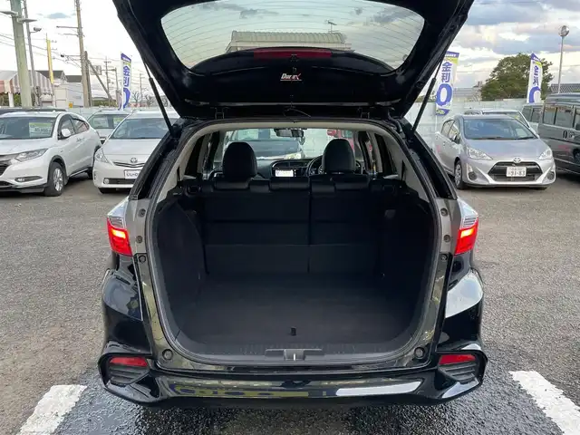 ホンダ シャトル ハイブリッド Z 徳島県 2015(平27)年 10.1万km クリスタルブラックパール (株)IDOMが運営する【じしゃロン徳島店】の自社ローン専用車両になりますこちらは現金またはオートローンご利用時の価格です。/自社ローンご希望の方は別途その旨お申付け下さい”										/										/衝突軽減被害軽減ブレーキ/純正ナビゲーション（フルセグ/CD/DVD/Bluetooth)/バックカメラ/トラクションコントロール/純正15インチアルミホイール/ビルトインETC/2カメラドライブレコーダー/ハーフレザーシート/シートヒーター/パドルシフト/プッシュスタート/スマートキー/オート電動格納ミラー/革巻きステアリング/ステアリングリモコン/純正フロアマット/サイドバイザー/Ｗエアバック/カーテンエアバック